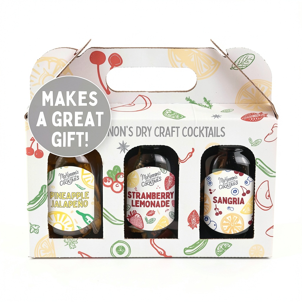McKinnons Vodka Trio Cocktail Mixes Gift Set Infusion Kit displayed on a wooden bar top with fresh garnish